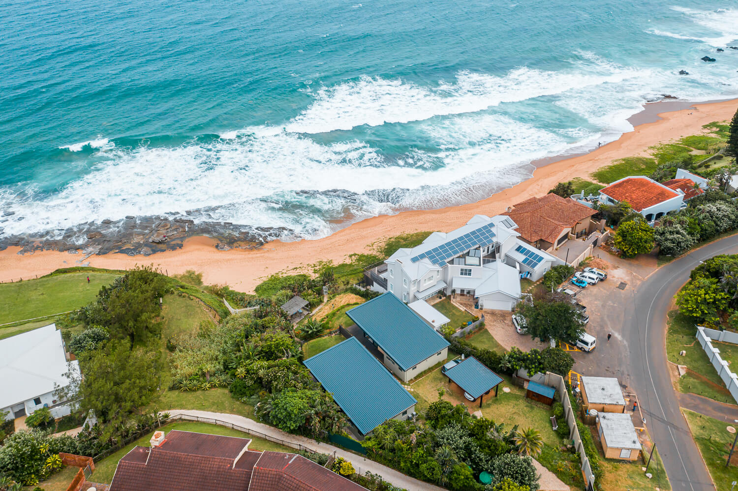 aeriel view of units with ocean